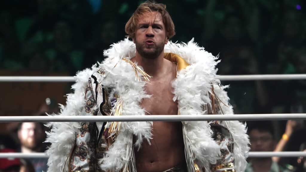 Will Ospreay in the ring wearing a fluffy coat at AEW Double or Nothing 2025