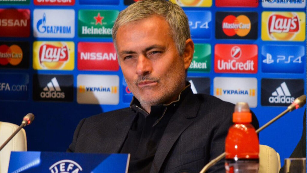 Jose Mourinho smirks during a Chelsea press conference in 2015