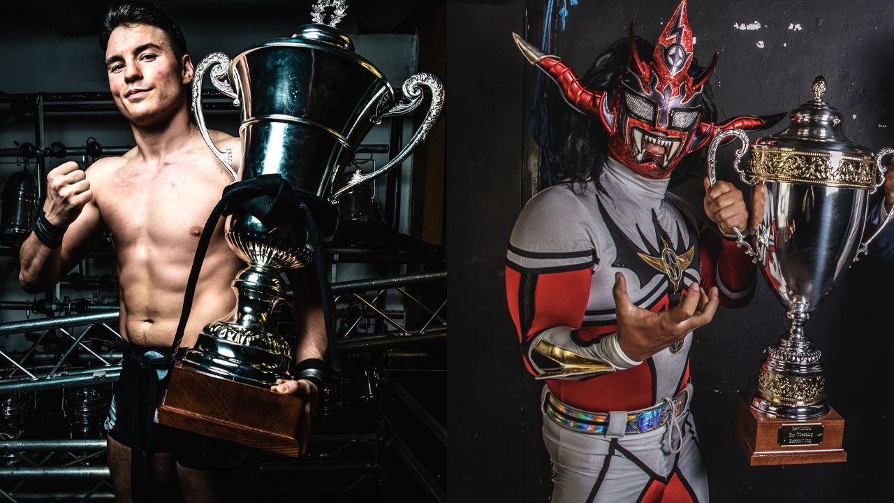 Mike Bailey and Jushin Liger holding their trophies after winning the RevPro British J Cup