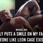 Michael Oku locks Leon Cage in the half boston crab as Cage screams in pain