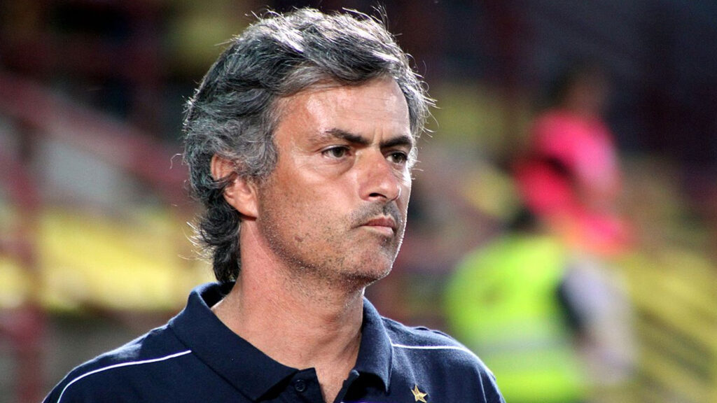 Jose Mourinho standing on the pitch before an Inter Milan match